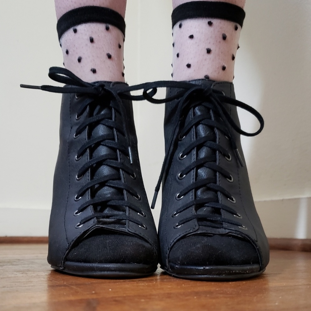 Cute black wedge heels.